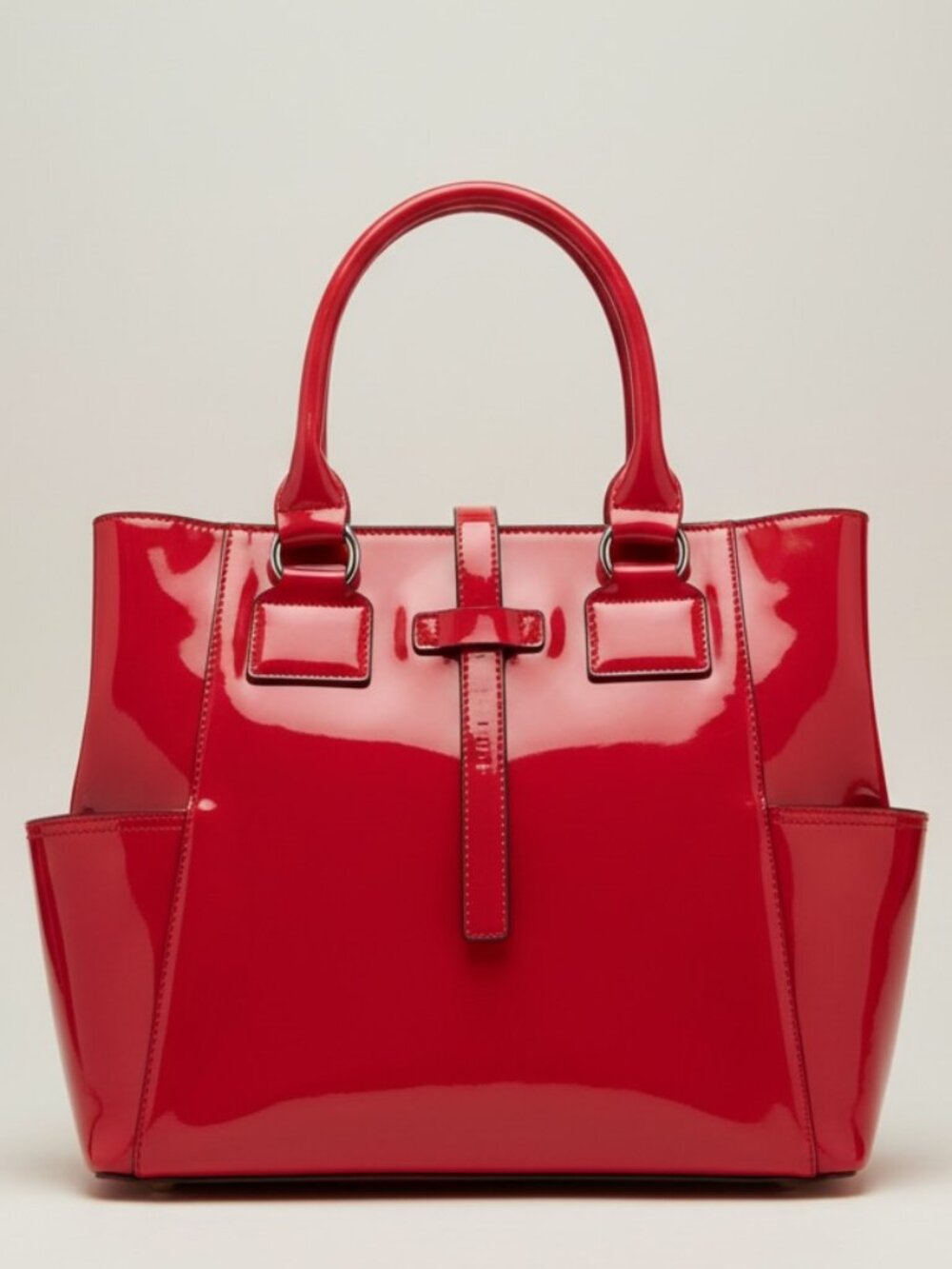 Red patent leather‑style handbag
